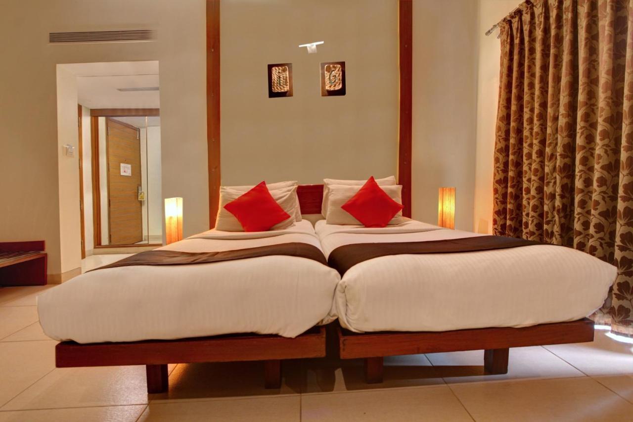 Capital O 16165 Cartier Hotel Bangalore Quarto foto