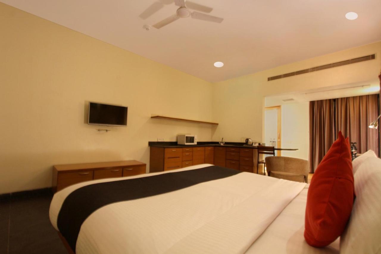 Capital O 16165 Cartier Hotel Bangalore Quarto foto