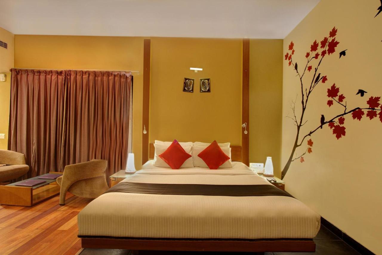 Capital O 16165 Cartier Hotel Bangalore Quarto foto